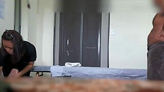 Massage girl resists happy ending but ends up stroking cock