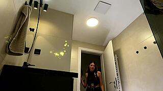 SEXY HORNY MILF WIFE FLASHES MASSIVE BOOBS IN SHEER TOP AND LEATHER MINISKIRT WHILE FINGERING IN BATHROOM!