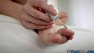 teen babe strokes cock hard with her sexy feet