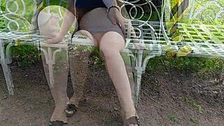 Sexy legs in a high-heeled park