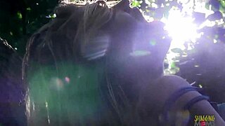 blonde climbs up the tree for her solo masturbation session