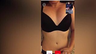 brunette watches stroking on cam