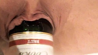 raven grey stretches her pussy with a bottle