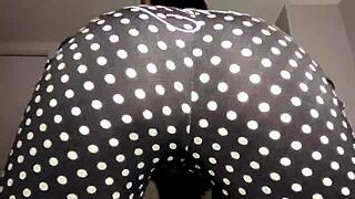 sensual teasing shaking ass in tight outfit n heels