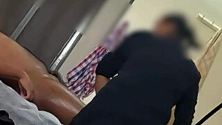 horny massage girl giving blowjob to client