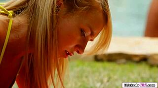 lesbian teen facesits her blonde friend outdoors