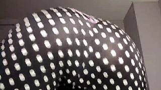 sensual teasing shaking ass in tight outfit n heels