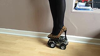 Toy car crushed under high heels