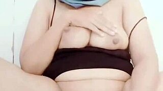 enjoying cucumber masturbation play on big pussy lips