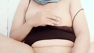 enjoying cucumber masturbation play on big pussy lips