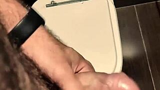 Quick handjob in shopping toilet stall