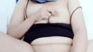 enjoying cucumber masturbation play on big pussy lips
