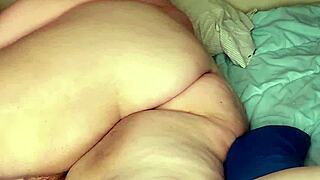 Curvy woman slowly moisturizes her fat tits and huge ass