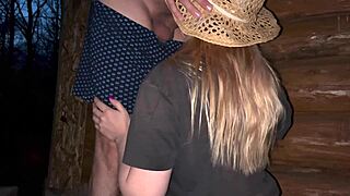 A pregnant milkmaid is fucking a city guy outside a barn
