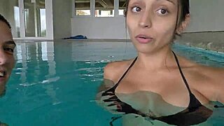 Muscular guy fucks tattooed babe by pool