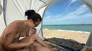 Making him cum in a public beach with people walking around