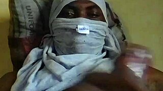 horny african man strokes big juicy cock at home