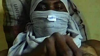 horny african man strokes big juicy cock at home