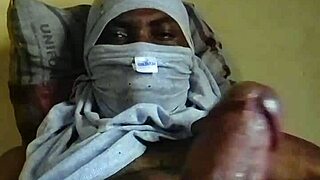 horny african man strokes big juicy cock at home