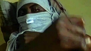 horny african man strokes big juicy cock at home