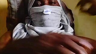 horny african man strokes big juicy cock at home